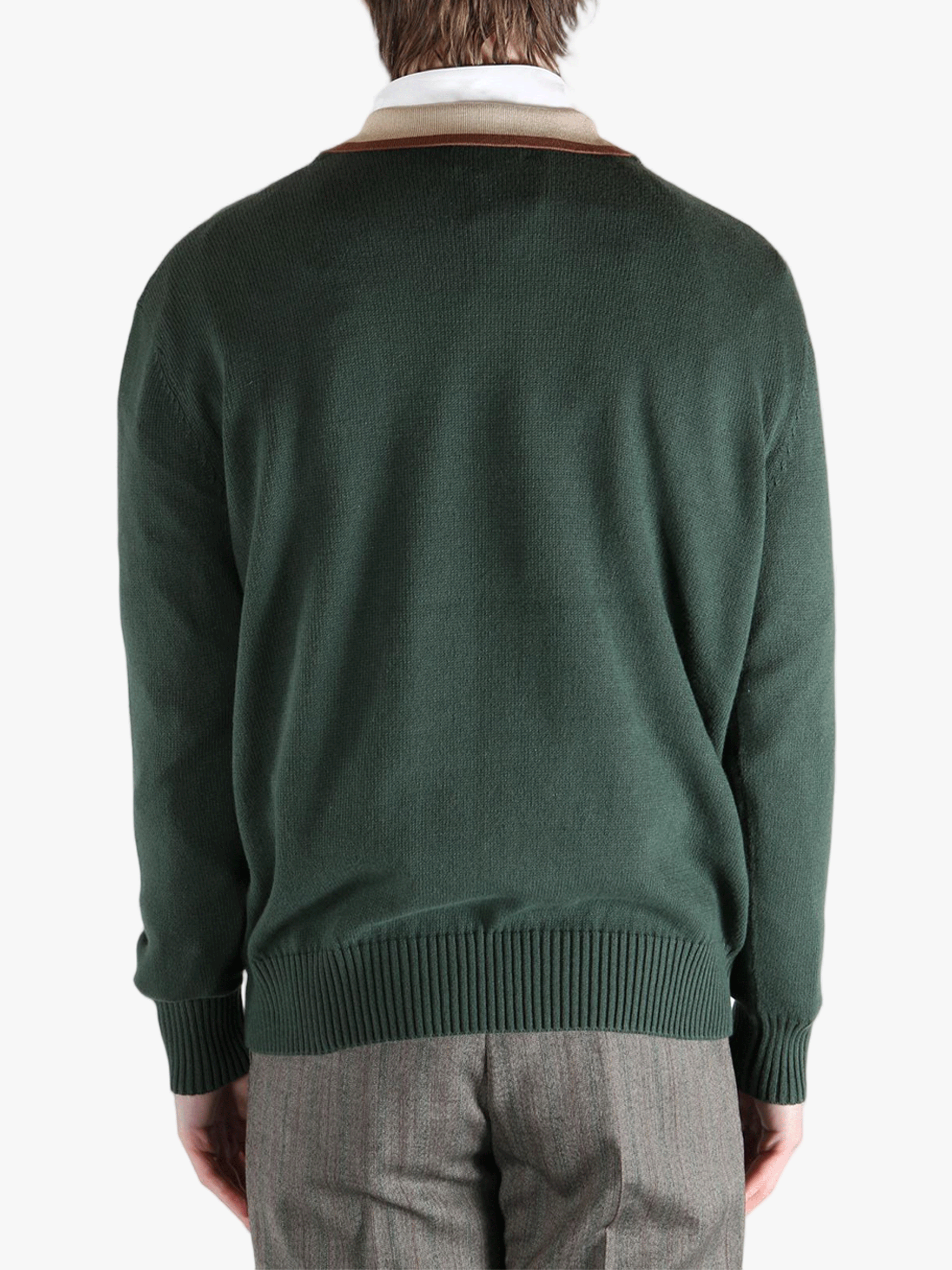 green tops worn by a person, showing the tops fit