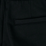 Close up of black pant, showing texture of the Cotton fabric