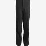 Black trouser worn by a person, showing the trouser's fit