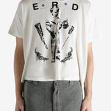 White t-shirt worn by a person, showing the t-shirt's fit