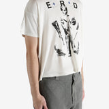 White t-shirt worn by a person, showing the t-shirt's fit