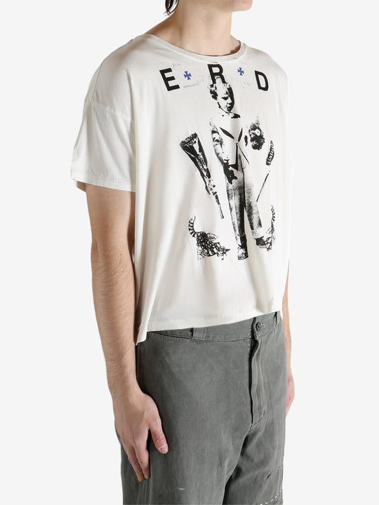 White t-shirt worn by a person, showing the t-shirt's fit