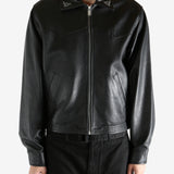 Black jacket worn by a person, showing the jacket's fit