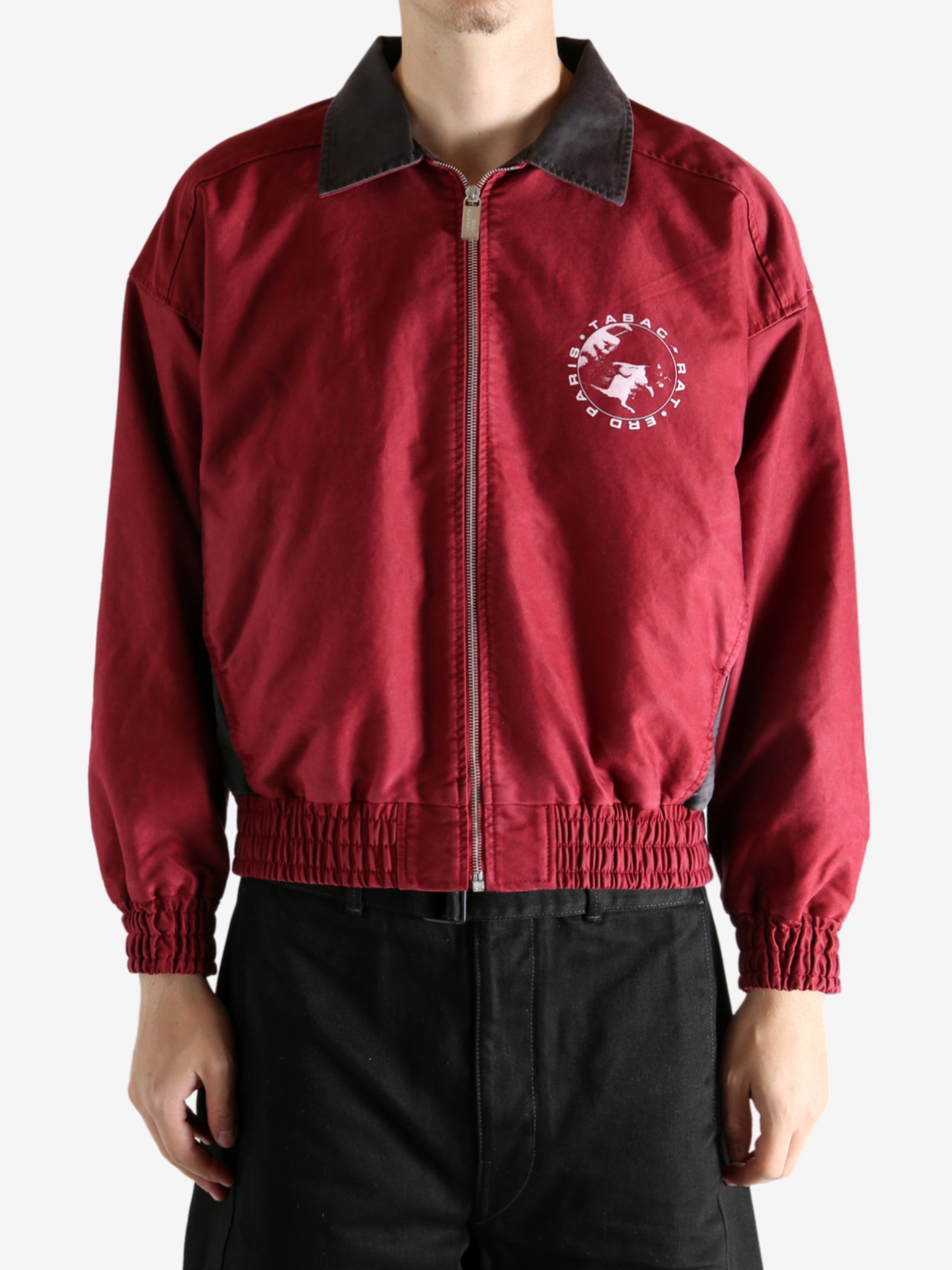 Red jacket worn by a person, showing the jacket's fit