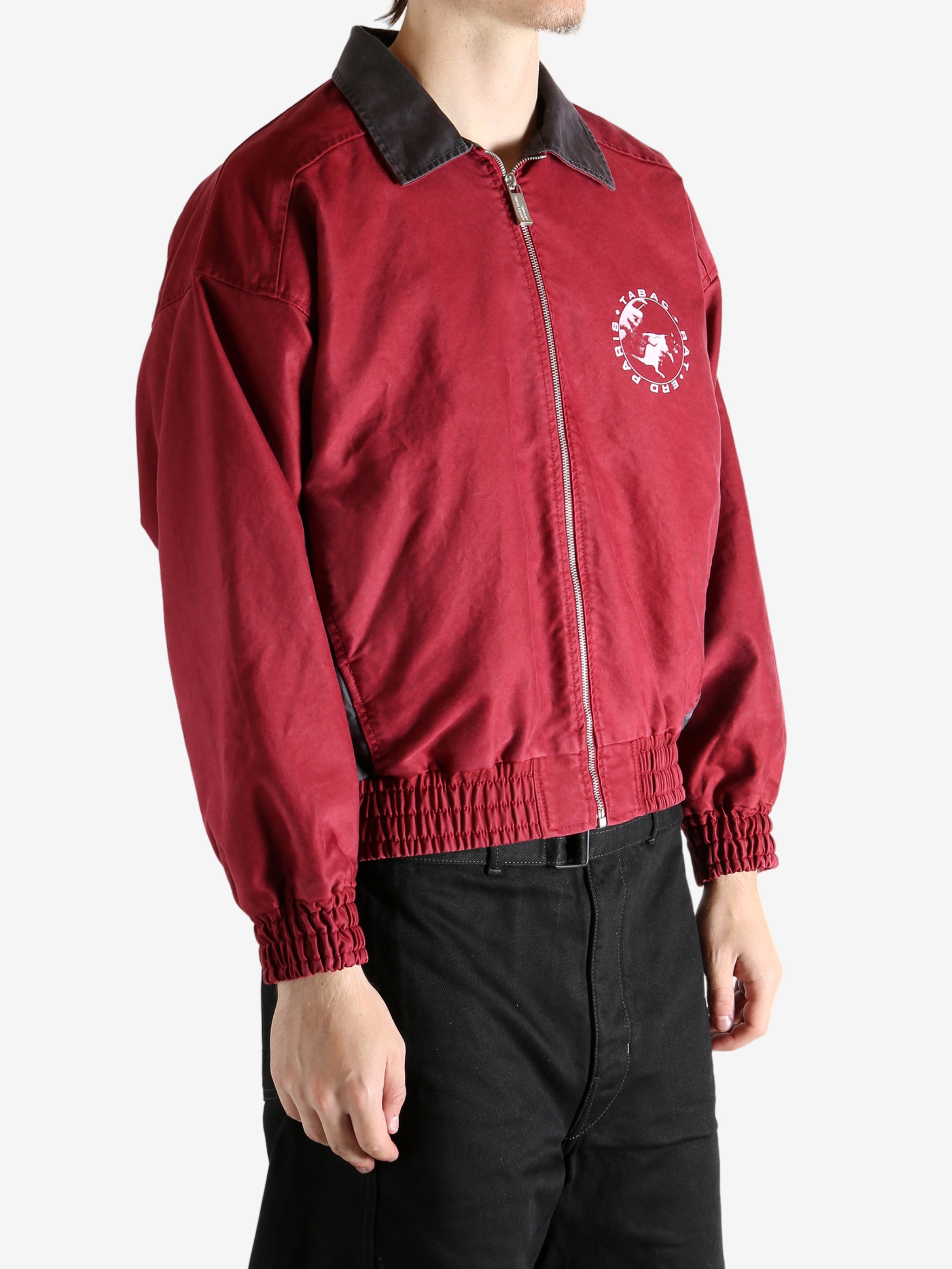 Red jacket worn by a person, showing the jacket's fit