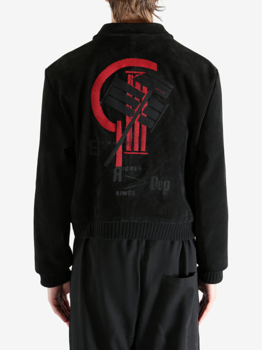 Black jackets worn by a person, showing the jackets fit