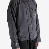 Black jacket worn by a person, showing the jacket's fit