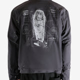 Black jacket worn by a person, showing the jacket's fit