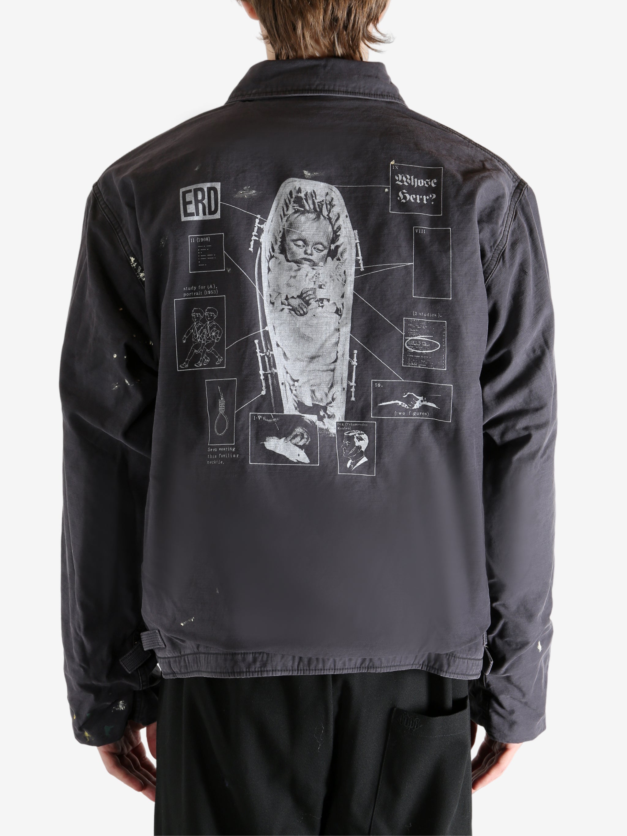 Black jacket worn by a person, showing the jacket's fit