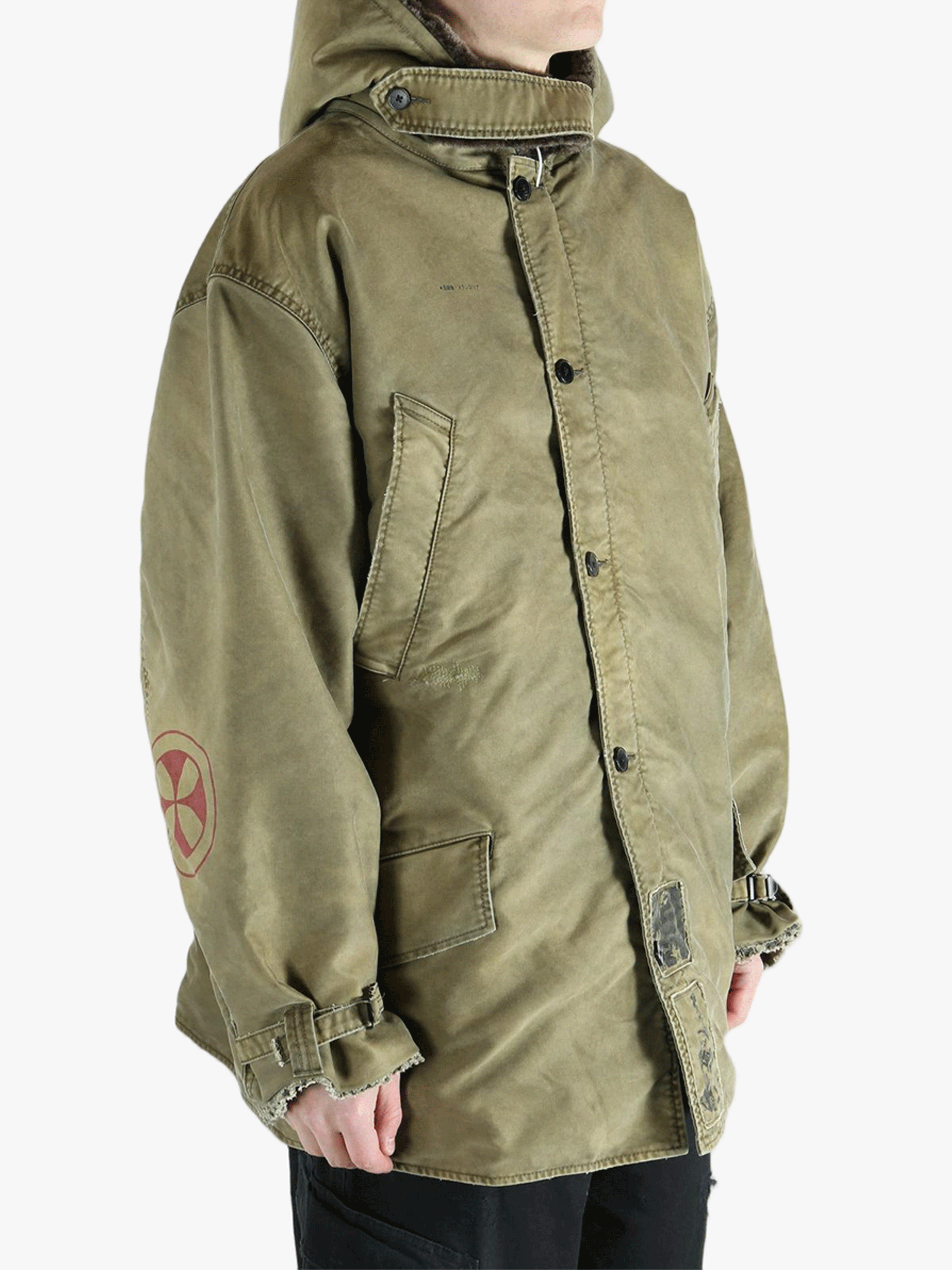 Green jackets-coats worn by a person, showing the cotton fit