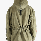 Green jackets-coats worn by a person, showing the cotton fit