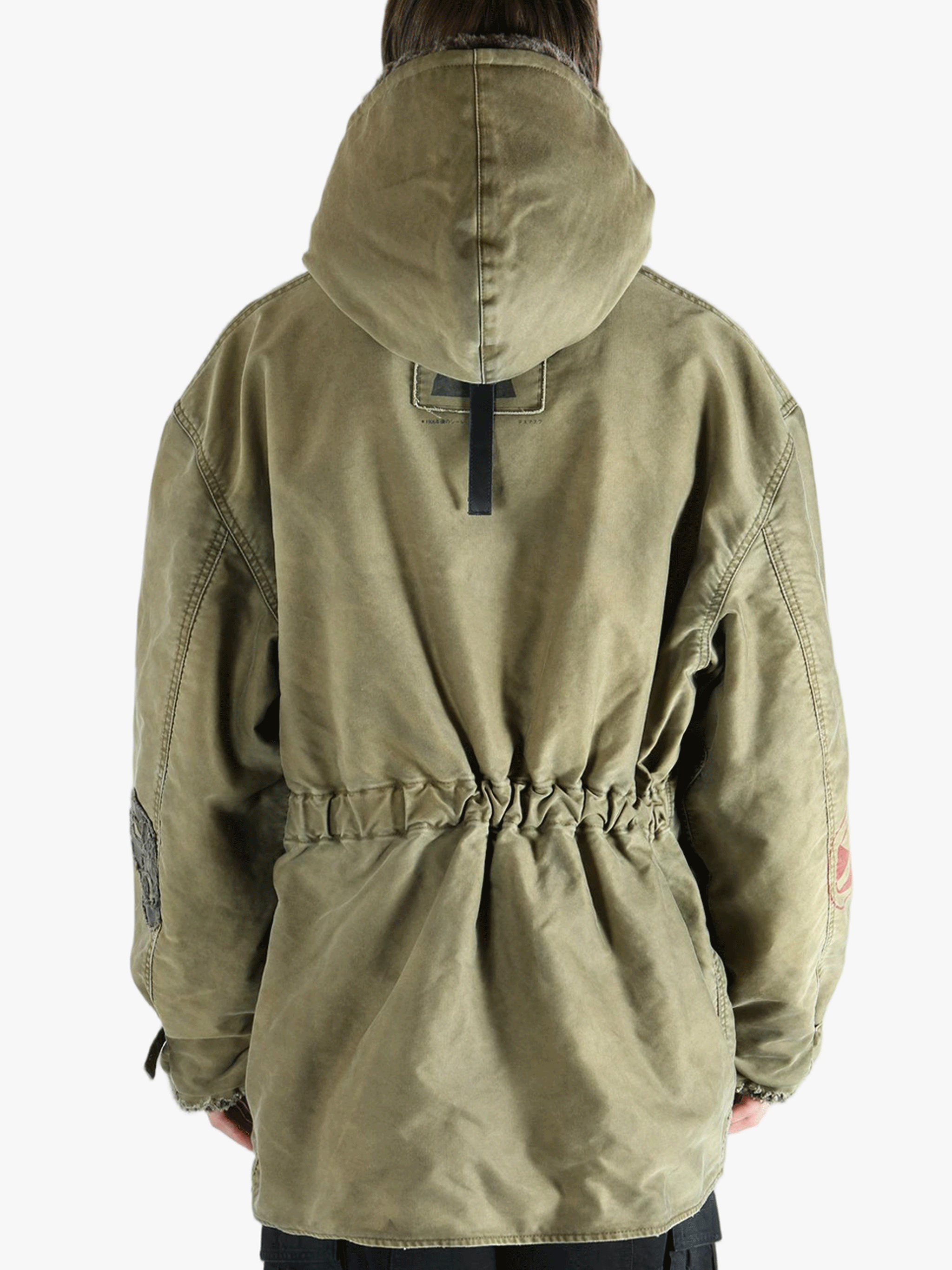Green jackets-coats worn by a person, showing the cotton fit