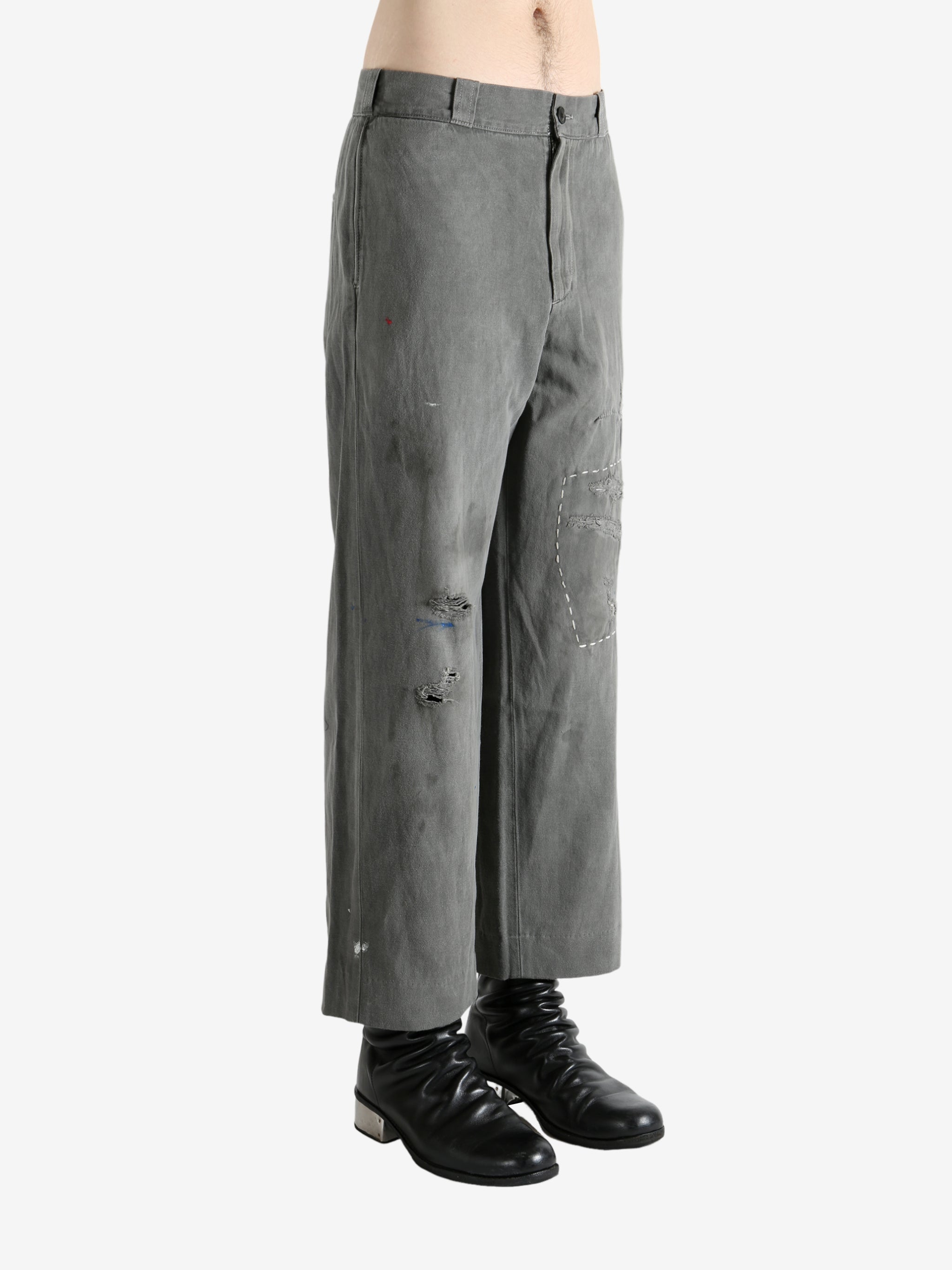 Grey pants worn by a person, showing the pants's fit