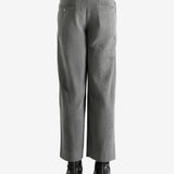 Grey pants worn by a person, showing the pants's fit