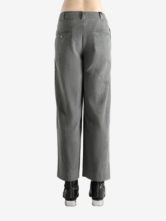 Grey pants worn by a person, showing the pants's fit