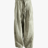 Light green wide-leg pants worn by a person, showing the pants fit
