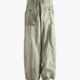 Light green wide-leg pants worn by a person, showing the pants fit