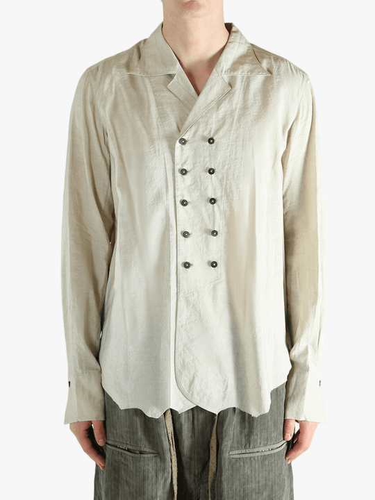 White shirt worn by a person, showing the shirt's fit