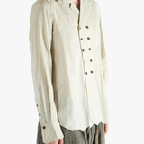 White shirt worn by a person, showing the shirt's fit