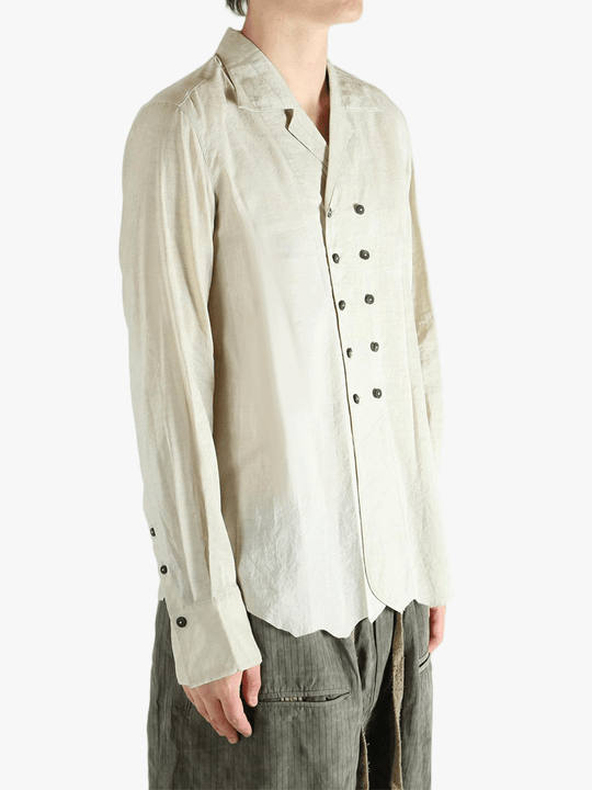 White shirt worn by a person, showing the shirt's fit