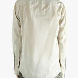 White shirt worn by a person, showing the shirt's fit