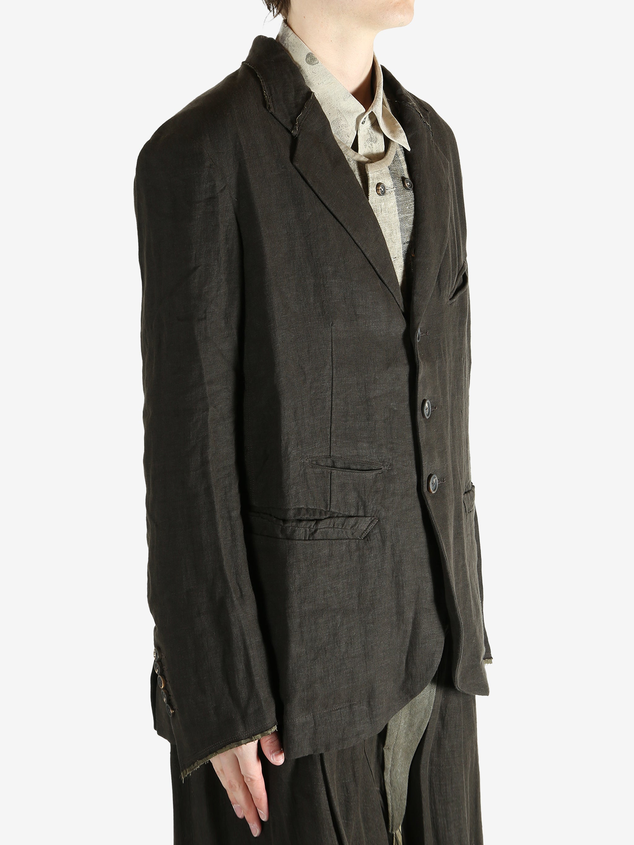 Black jackets worn by a person, showing the jackets fit