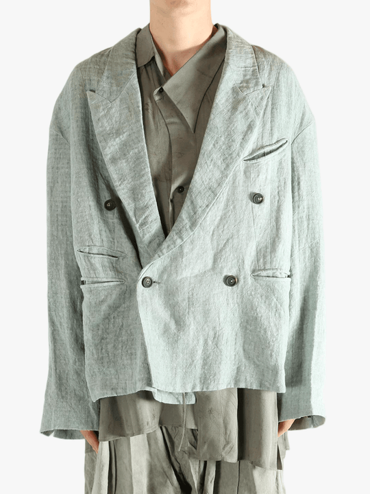 Grey jackets worn by a person, showing the jackets fit
