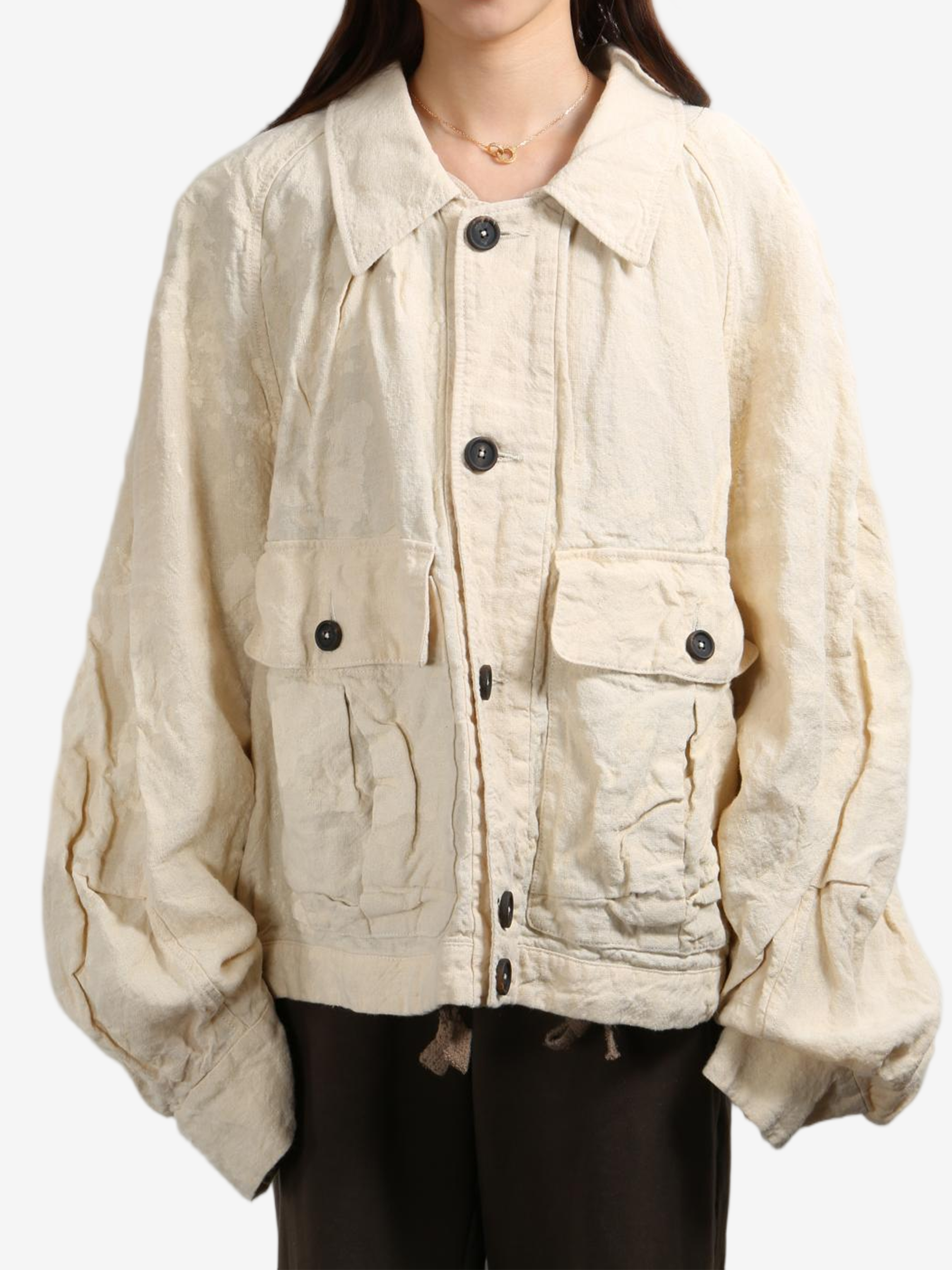 Tan jacket worn by a person, showing the tan jacket's fit