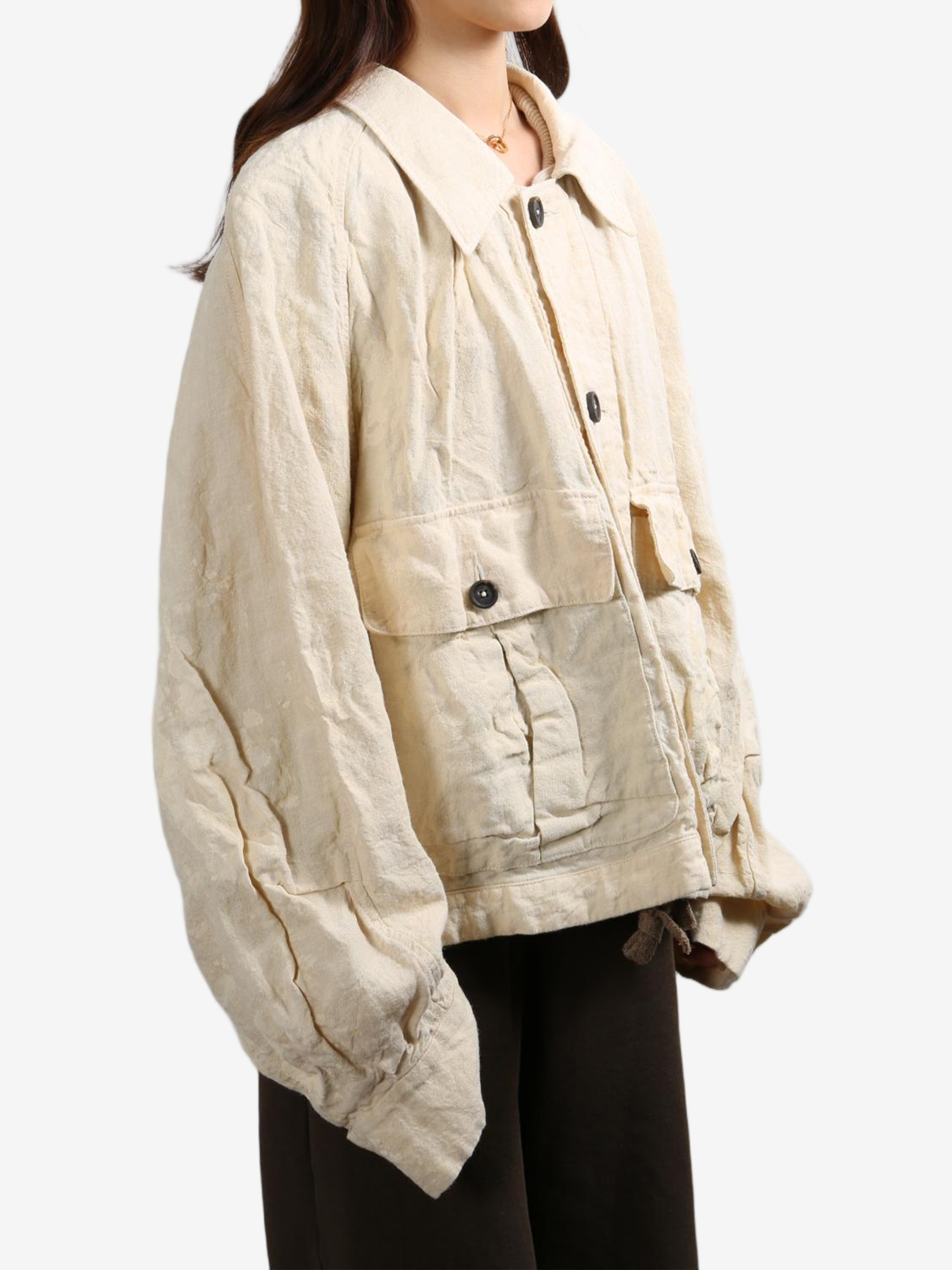 Tan jacket worn by a person, showing the tan jacket's fit