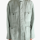 Green shirt worn by a person, showing the shirt's fit