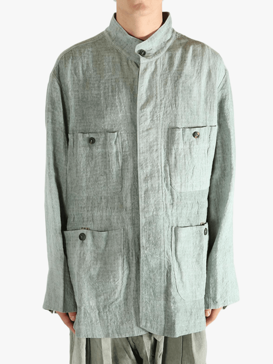 Green shirt worn by a person, showing the shirt's fit