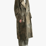 Green coat worn by a person, showing the coat's fit