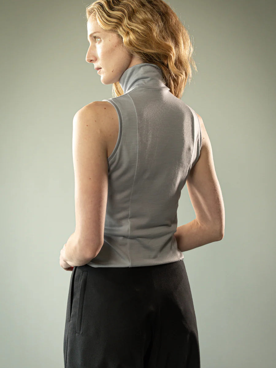 Grey top worn by a person, showing the top's fit