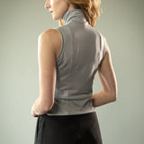Grey top worn by a person, showing the top's fit