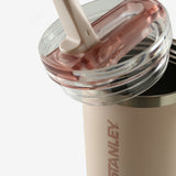 Close up of pink tumbler, showing texture of the stainless steel fabric