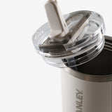 Close up of white tumbler, showing texture of the stainless steel fabric