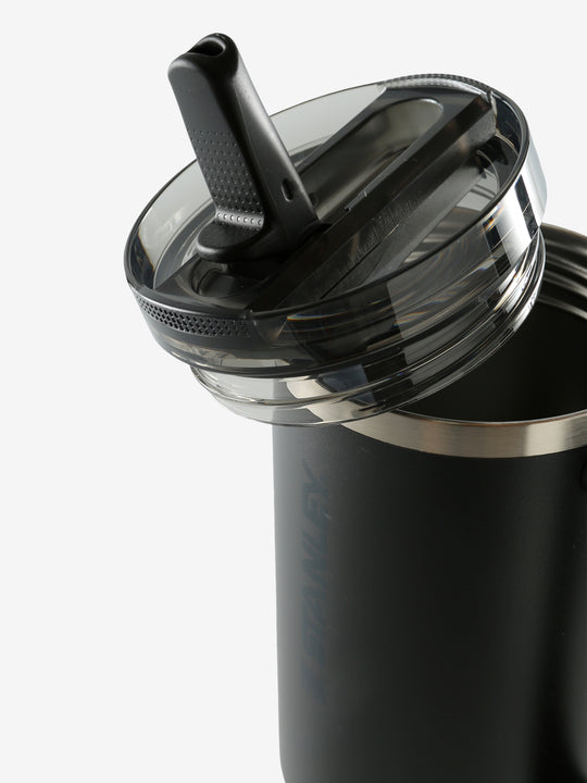 Close up of black tumbler, showing texture of the stainless steel fabric
