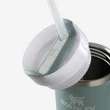 Close up of green tumbler, showing texture of the stainless steel fabric