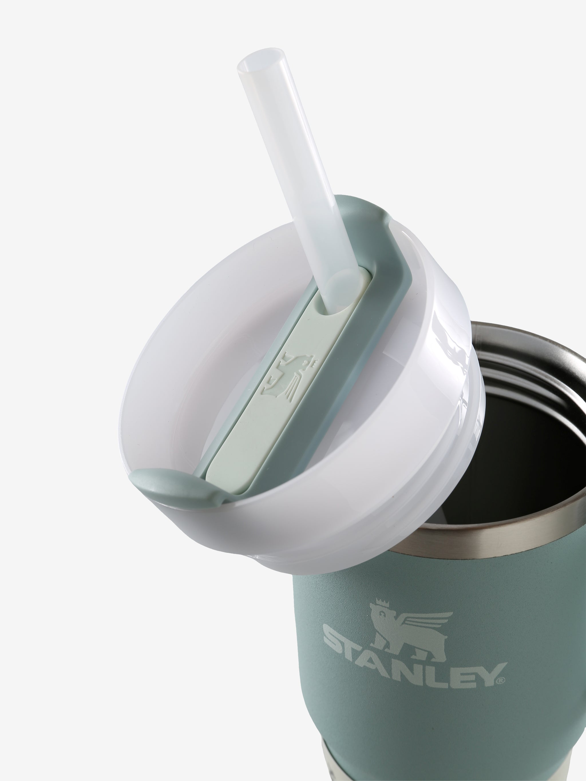 Close up of green tumbler, showing texture of the stainless steel fabric