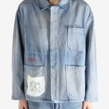 Blue jacket worn by a person, showing the jacket fit