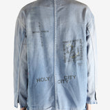 Blue jacket worn by a person, showing the jacket fit