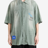Green shirt, full body view