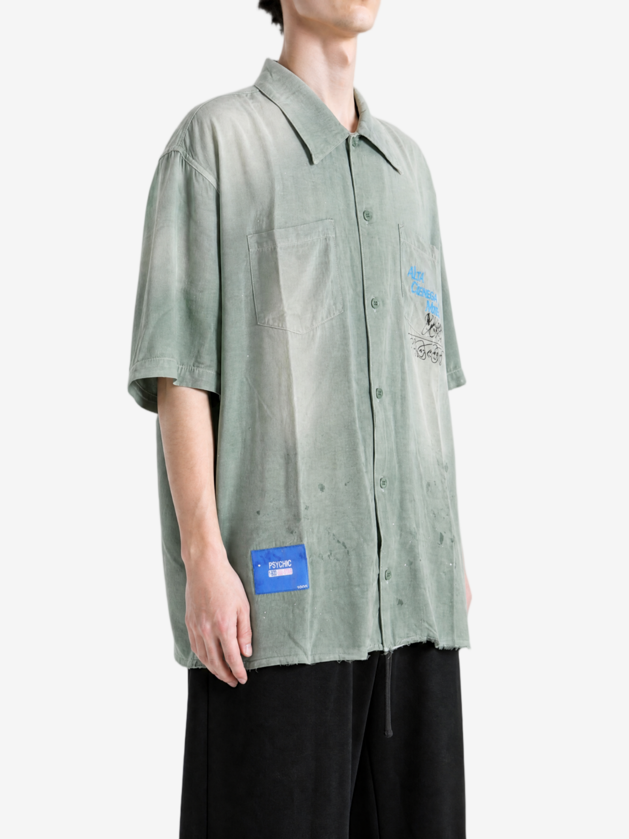 Green shirt, full body view