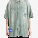 Green shirt, full body view
