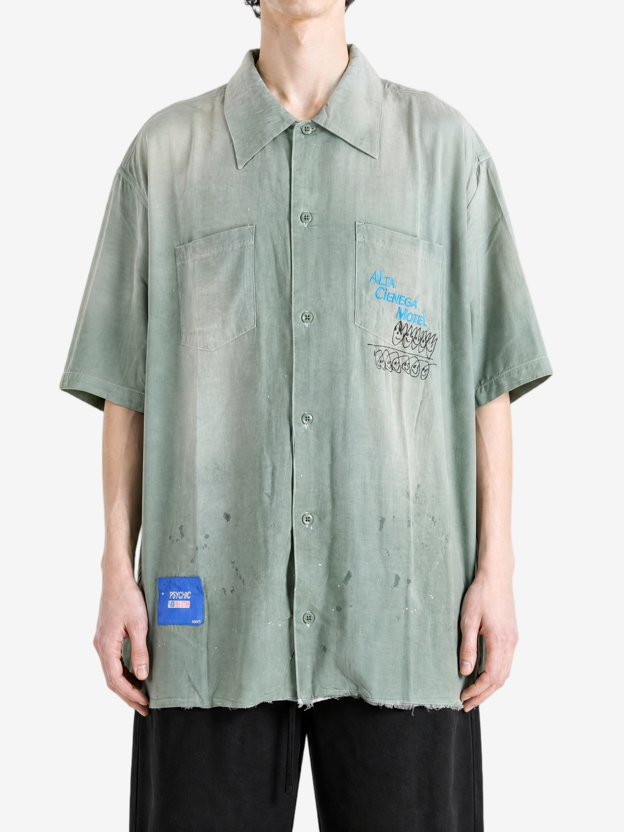 Green shirt, full body view