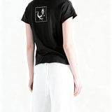 Black t-shirt worn by a person, showing the t-shirt fit