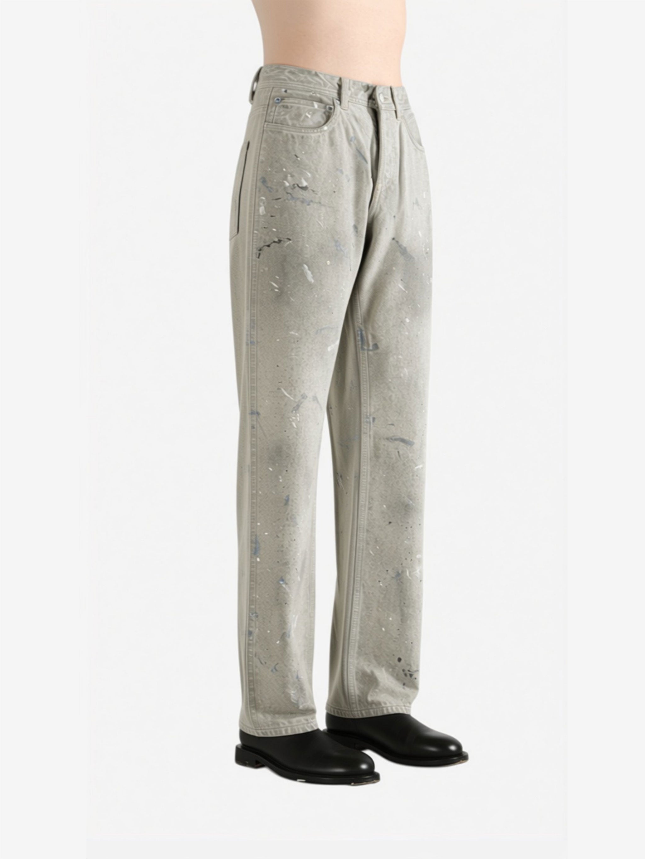 White jeans worn by a person, side view