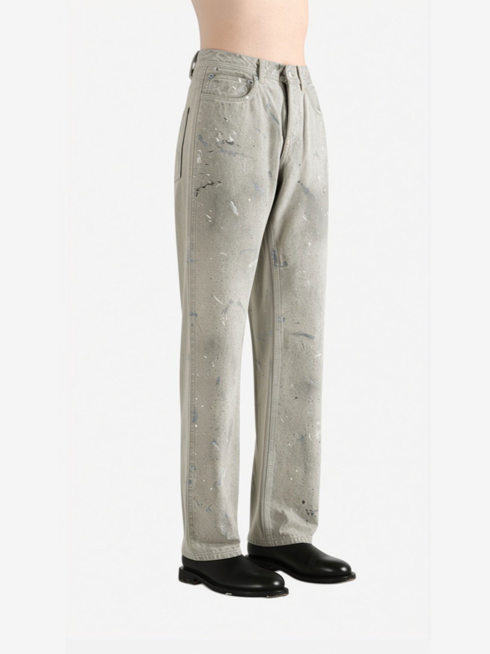 White jeans worn by a person, side view