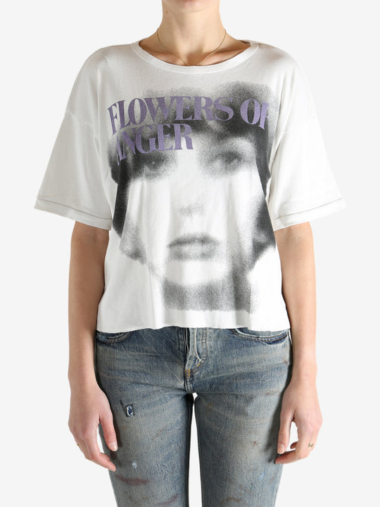 White t-shirt worn by a person, showing the shirt's fit