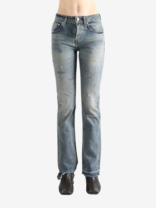 Blue pants worn by a person, showing the pants fit